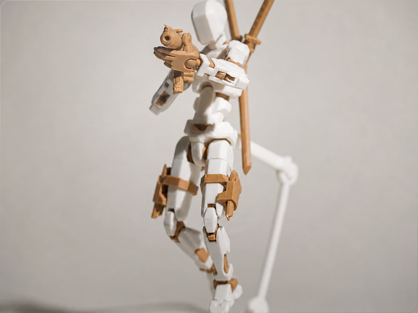 White and tan Dummy 13 figure loaded with blasters, blades, and display gear