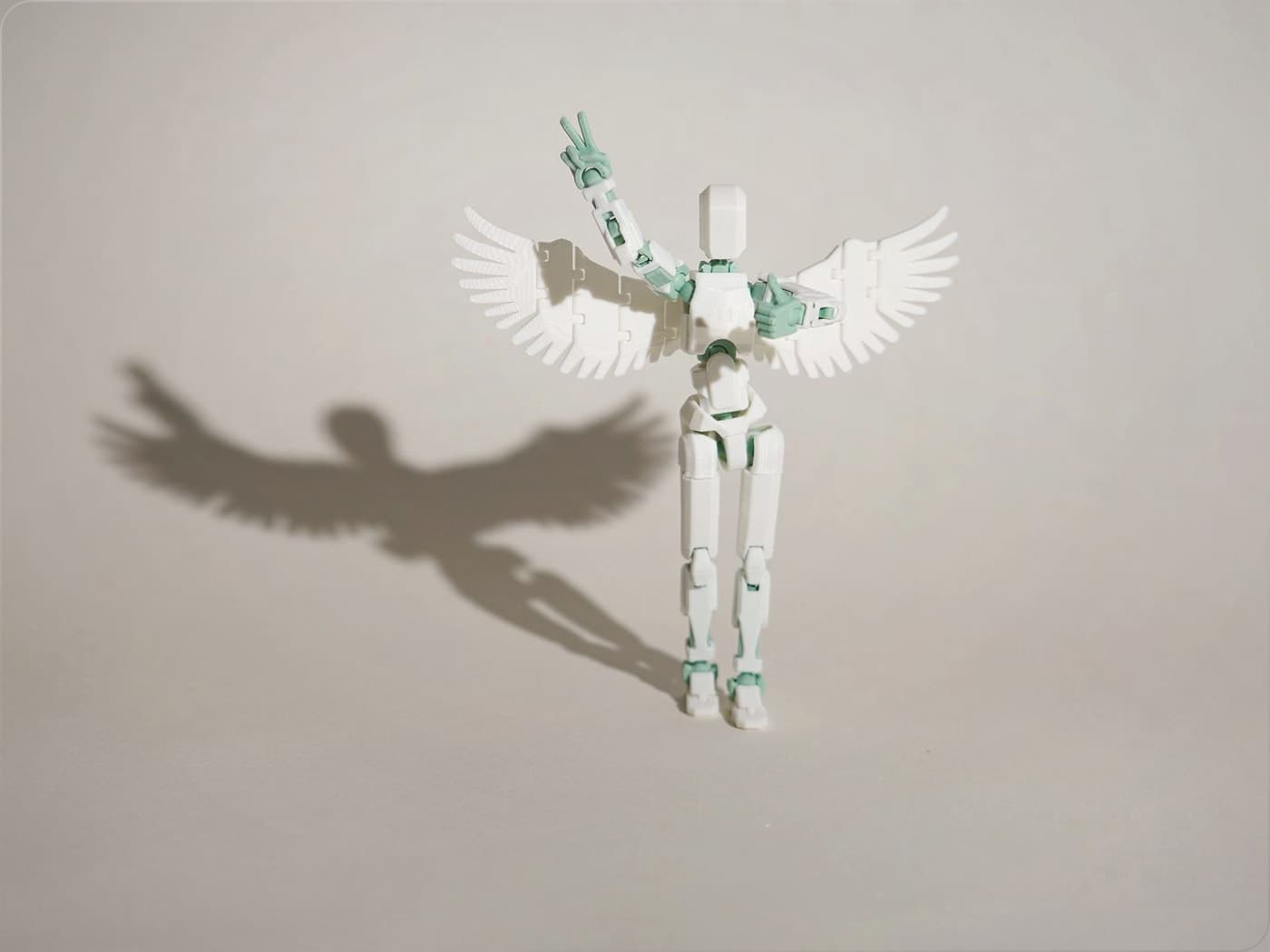 Mint and white winged Dummy 13 guardian in a wide display pose